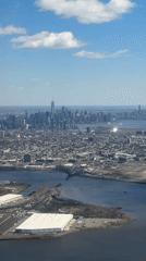 Aerial view captures NYC skyline with Freedom Tower