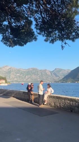 Photoshoot and leisure activities captured in scenic Perast, Montenegro