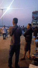 Jepara ferry port at dusk, loading up and pushing off