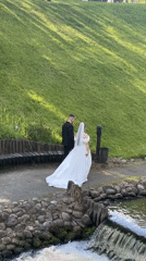 Wedding at a Vilnius watermill and stream setting