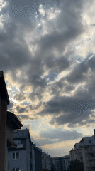 Dramatic sky conditions documented over city during afternoon hours