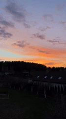 Dramatic sunset captured over Belarus residential area April 23