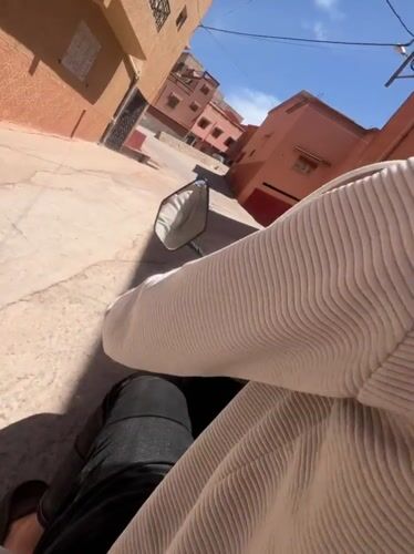 Motorcyclist documents afternoon ride through Ouaouizert's colorful streets