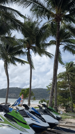 Morning beach activity documented in Patong, Thailand