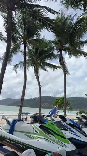 Morning beach activity documented in Patong, Thailand