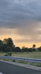 Evening highway drive through rural Bulgaria at sunset