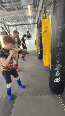 Boy practices martial arts in Perm gymnasium