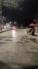 Mobile street vending setup on a Samarinda night street