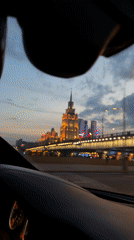 Evening drive captured through illuminated Moscow streets