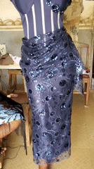Woman spotted in formal dark blue sequined dress