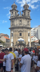 Crowd gathers at baroque church plaza in Pontevedra