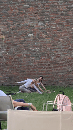 Yoga and dining scene captured at Belgrade outdoor venue