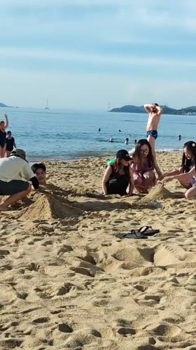 Sand burial fun on a Nha Trang beach