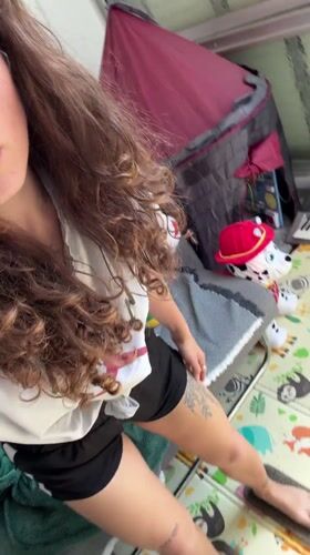 Young woman takes selfies indoors in Kiryat Bialik