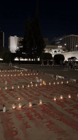 Evzone ceremony and candlelit memorial at Syntagma Square