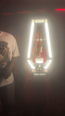 Woman takes whiskey bottle from display in Abuja nightclub
