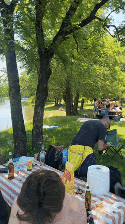 Community enjoys sunny picnic day at Lake Ghirla, Italy