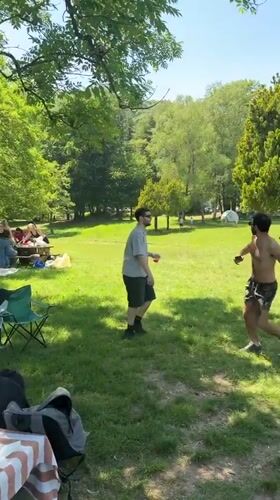 Community enjoys sunny picnic day at Lake Ghirla, Italy