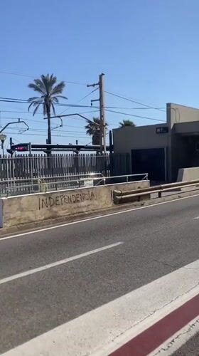 Car passes Vilassar de Mar train station in Spain