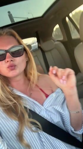 Woman celebrates with peace sign while driving in Israel