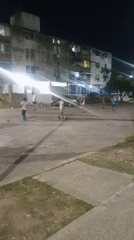 Children play nighttime soccer in Tinaquillo Venezuela streets