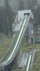 Ski jumpers practice on Zakopane hill during morning session