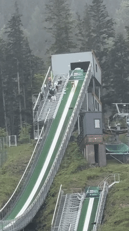 Ski jumpers practice on Zakopane hill during morning session