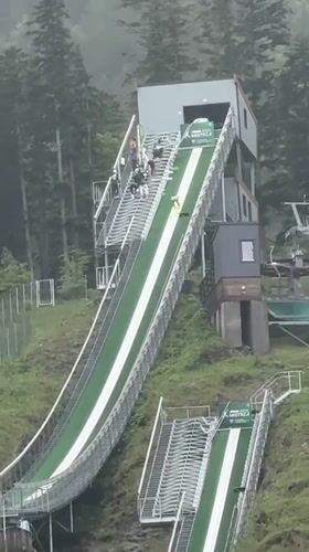 Ski jumpers practice on Zakopane hill during morning session