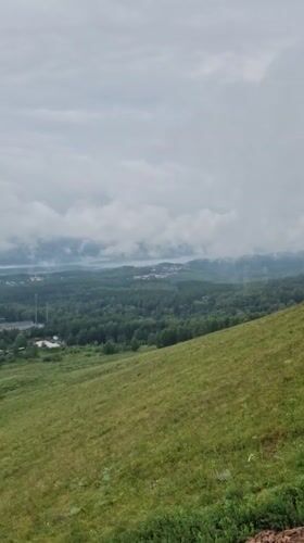 Hilltop overlook above Krasnoyarsk on a cloudy summer morning