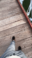 Tourist documents bridge visit in Morocco's Atlas Mountains region