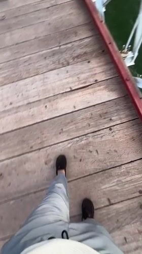 Tourist documents bridge visit in Morocco's Atlas Mountains region