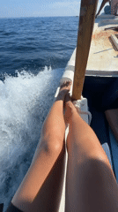 Scuba diving group prepares and departs on boat excursion