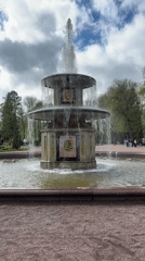 Tourists capture fountains and folk dancing at Peterhof Palace