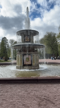 Tourists capture fountains and folk dancing at Peterhof Palace