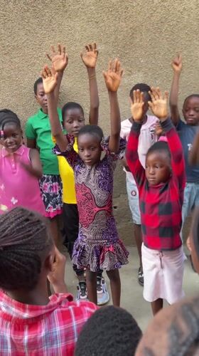 Children's birthday party held in Nyanya, Nigeria courtyard