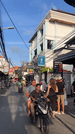 Street life and a beach sunset in Kuta, Bali