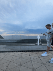 Afternoon Life at Waterfront Plaza: Fountains, Families, Birds