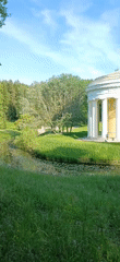 Visitor documents afternoon stroll through historic Pavlovsk Park, Russia
