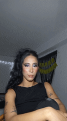 Woman in elaborate purple makeup documented in Porlamar morning session