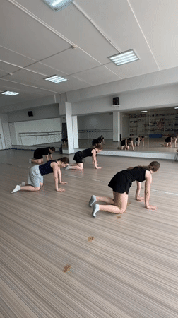 Dancers practice floor routines in Votkinsk studio