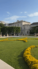 Tourist captures iconic Salzburg landmarks during afternoon visit