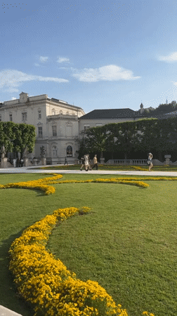 Tourist captures iconic Salzburg landmarks during afternoon visit