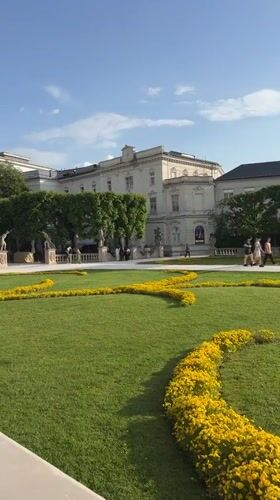 Tourist captures iconic Salzburg landmarks during afternoon visit