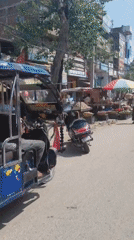Sugarcane market stalls and street activity in Patna