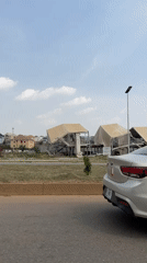 Damaged structures documented along Abuja roadside amid strong winds