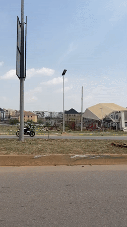 Damaged structures documented along Abuja roadside amid strong winds