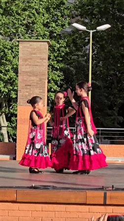 Flamenco and group dance routines on an outdoor Cornellà stage