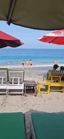 Early morning beach activities documented in Karangasem, Indonesia