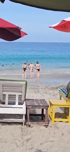 Early morning beach activities documented in Karangasem, Indonesia
