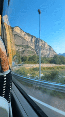 Rolling through Mezzolombardo from a bus window seat